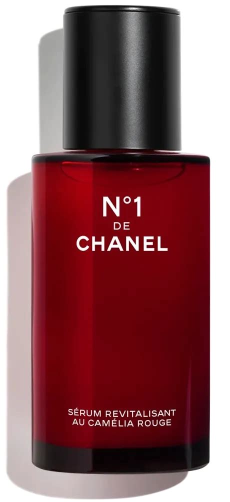 chanel sérum camélia|Chanel vase with flowers.